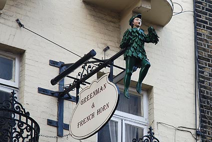 Sign for the The Green Man and French Horn pub on St. Martins Lane