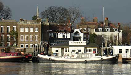 The Dove public house from the south bank of the Thames London