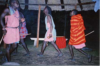 Masaii dancing, Emails from Africa, a journey through  Kenya, Ethiopia, Uganda, Rwanda and the Congo