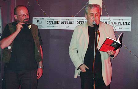 Paul Birtill reads in the cabaret room. Vic illuminates his book! OFFLINE club at the Dogstar, Brixton, Thursday 30th June 2005, urban75 club night, London.