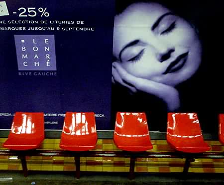 red seats and advert, Paris, France