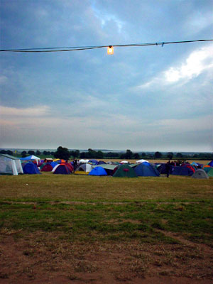 Tents, clouds and light bulb