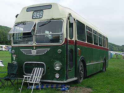 Old bus, camp site, Big Chill festival, Eastnor Castle 2004, England UK