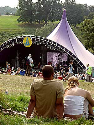 Relaxing by the Chill stage, Big Chill festival, Eastnor Castle 2004, England UK
