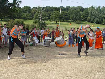 Orange drummers, Big Chill festival, Eastnor Castle 2004, England UK