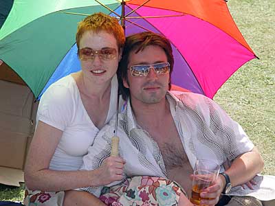 Sunshade and beer, Big Chill festival, Eastnor Castle 2004, England UK