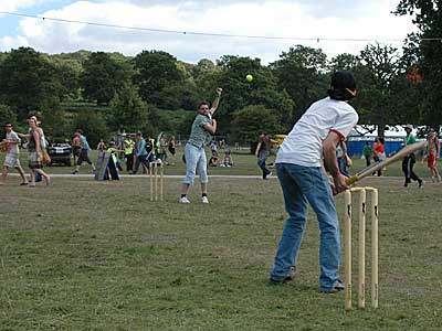 Cricket match in progress, Big Chill festival, Eastnor Castle, Ledbury, Herefordshire, England UK