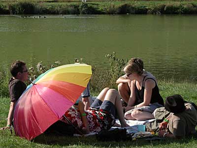 Picnic by the lake, Big Chill festival, Ledbury, Herefordshire, England UK