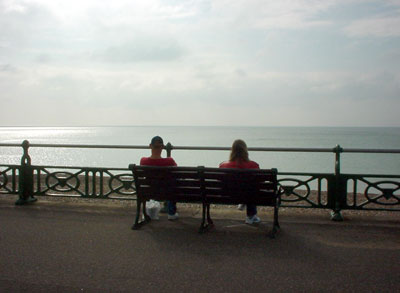 Couple staring out to sea