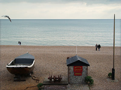 Boat, hut, seagulls, walkers, Brighton Beach, Brighton, East Sussex