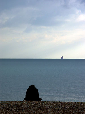 One man and a boat, Brighton beach, Brighton, East Sussex