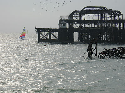 Sailing past the West Pier, Brighton, East Sussex