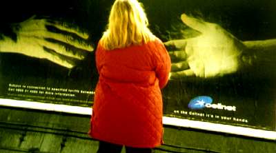 Woman and hands, tube station