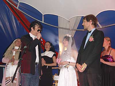 Larry Love from the Alalbama 3 marries a couple in the The Chapel of Love and Loathing,  Glastonbury Festival, June 2004
