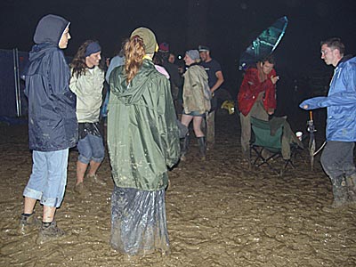 Glooping in the mud to Orbital, The Other stage area, Glastonbury Festival, June 2004