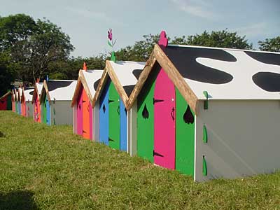 Backstage wooden huts, Backstage Hospitality camping area, Glastonbury Festival, Pilton, Somerset, England June 2005