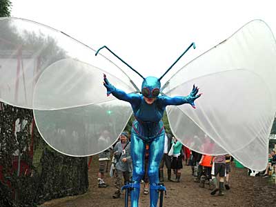 Big human fly thing on stilts, Glastonbury Festival, Pilton, Somerset, England June 2005