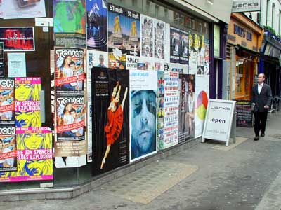Bill posters, Old Compton Street, Soho, London W1