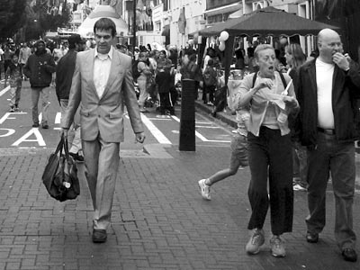 Man in a grey suit, Somerstown Festival of Cultures, St Pancras, London