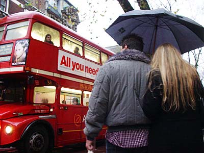 Umbrella and Routemaster bus, Charing Cross Road, London