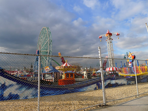 Coney Island and Brighton beach, southern Brooklyn, New York, United States with photos of the boardwalks, amusement park, pier, funfair rides, shopfronts and beach