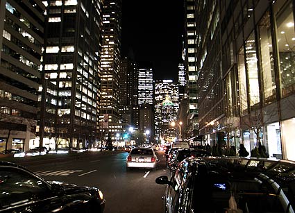 A dazzling array of office lights and shiny cars on Park Avenue. Night photographs on the streets of New York, NYC, December 2006