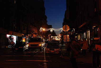 Orchard Street, between Delancey and Broome, near Delancey. Night photographs on the streets of New York, NYC, December 2006