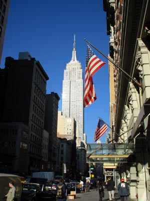 Empire State and US flag, Broadway, Manhattan, New York