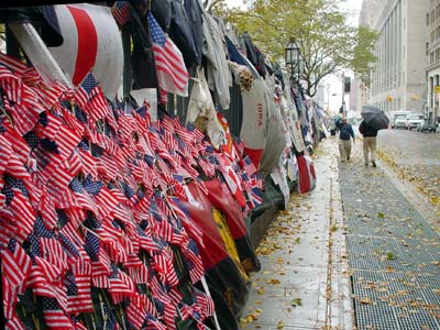 American flags in the rain, World Trade towers site, Manhattan, New York