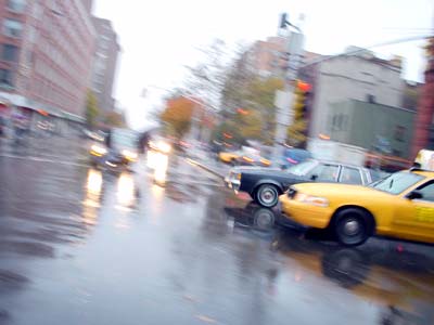 Cabs and rain, E Houston Street, Manhattan, New York