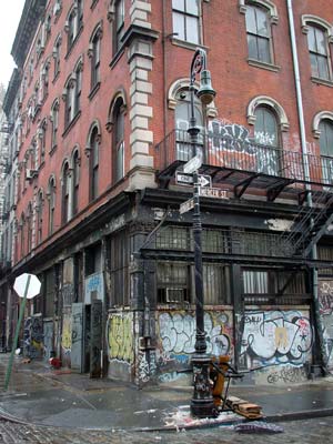 Graffiti-covered building, Mercer/Howard St, SoHo, Manhattan, New York