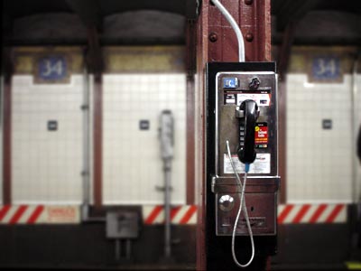 Telephone and tiles, 34th Street subway, Manhattan, New York