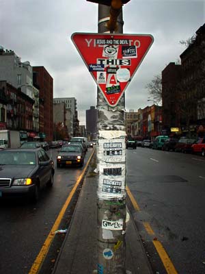 Stickers and street sign, Bowery, Manhattan, New York