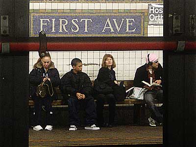 Waiting for the subway, First Avenue, Manhattan, New York, NYC, USA