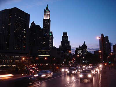 Woolworths building at night from the Brooklyn Bridge, Manhattan, New York, USA