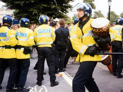Cop with bongo, Reclaim the Streets, Brighton 