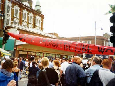 Support the tube workers banner, Reclaim the Streets, Brixton High Road, June 1998 