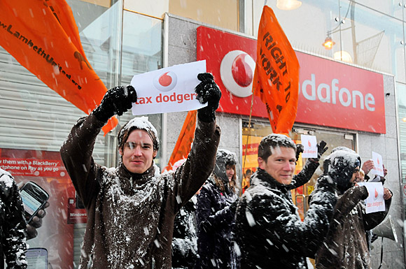 Brixton protest against tax dodgers Vodafone and Topshop, Brixton Road, London 11am, 18th December 2010