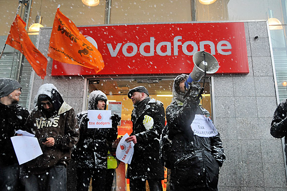 Brixton protest against tax dodgers Vodafone and Topshop, Brixton Road, London 11am, 18th December 2010