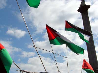 Palestinian flags, blue sky, Trafalgar Square, 13th April, 2002