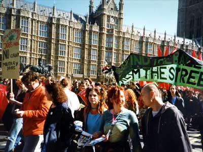 Marching past Westminster, Reclaim The Streets, London 12th April 1997