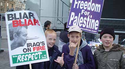 Da Yoot holding anti--Blar and Pro-Palestine banners.
