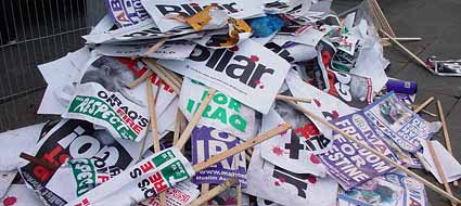 End of the protest. Pile of discarded banners from the March 20th anti-war protest in London