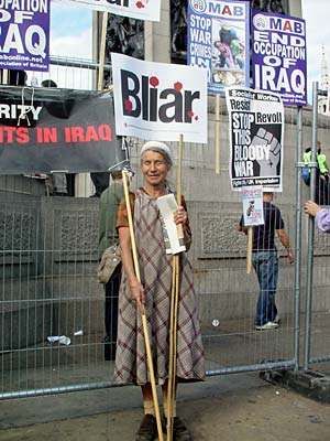 Lady and 'Bliar' banner, Trafalgar Square, Stop the War in Iraq protest, London, Sept 27th 2003