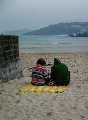 Die-hard holidaymakers, St Ives harbour, Cornwall, March 2003
