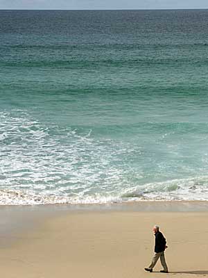 Lone walker, Porthmeor Beach, St Ives, Cornwall, April 2004