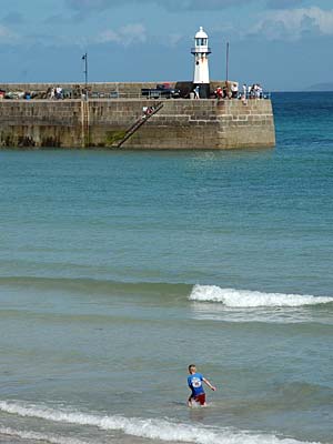 Boy in the harbour, St Ives, Cornwall, August 2005