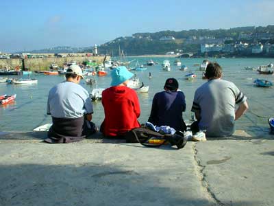 Watching the boats, harbour, St Ives, Cornwall, August 2002