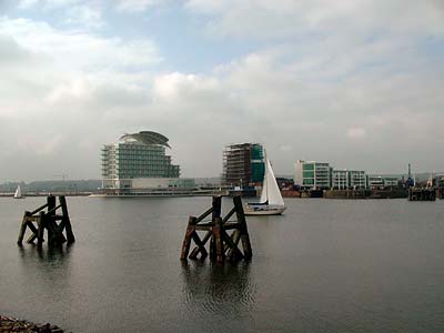 Sail boat in the bay, Cardiff Bay, Cardiff, south Wales photos
