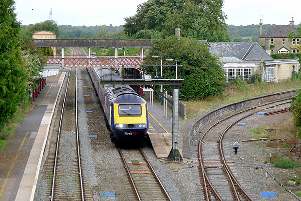 Kemble railway station, Gloucestershire, with photos of station platforms, buildings, canopy and footbridge and Cirencester branch platform